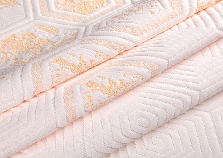 Stretch Knitted Mattress Fabric Conforms to Contoured Designs